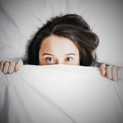 Girl can't sleep because of worry and anxiety creating insomnia